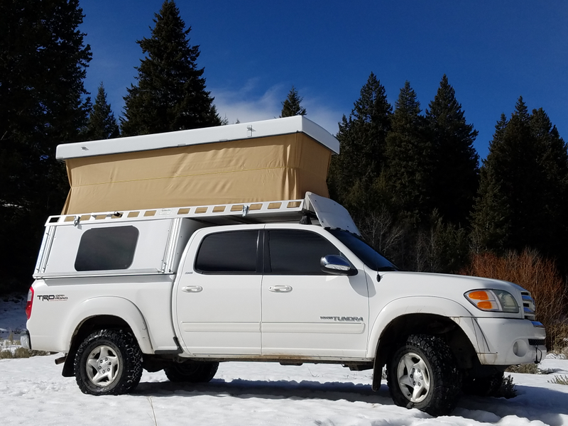 Illustration for article titled At $14,500, Could This 2004 Toyota Tundra TRD Camper Have You Saying Get Outta Town?